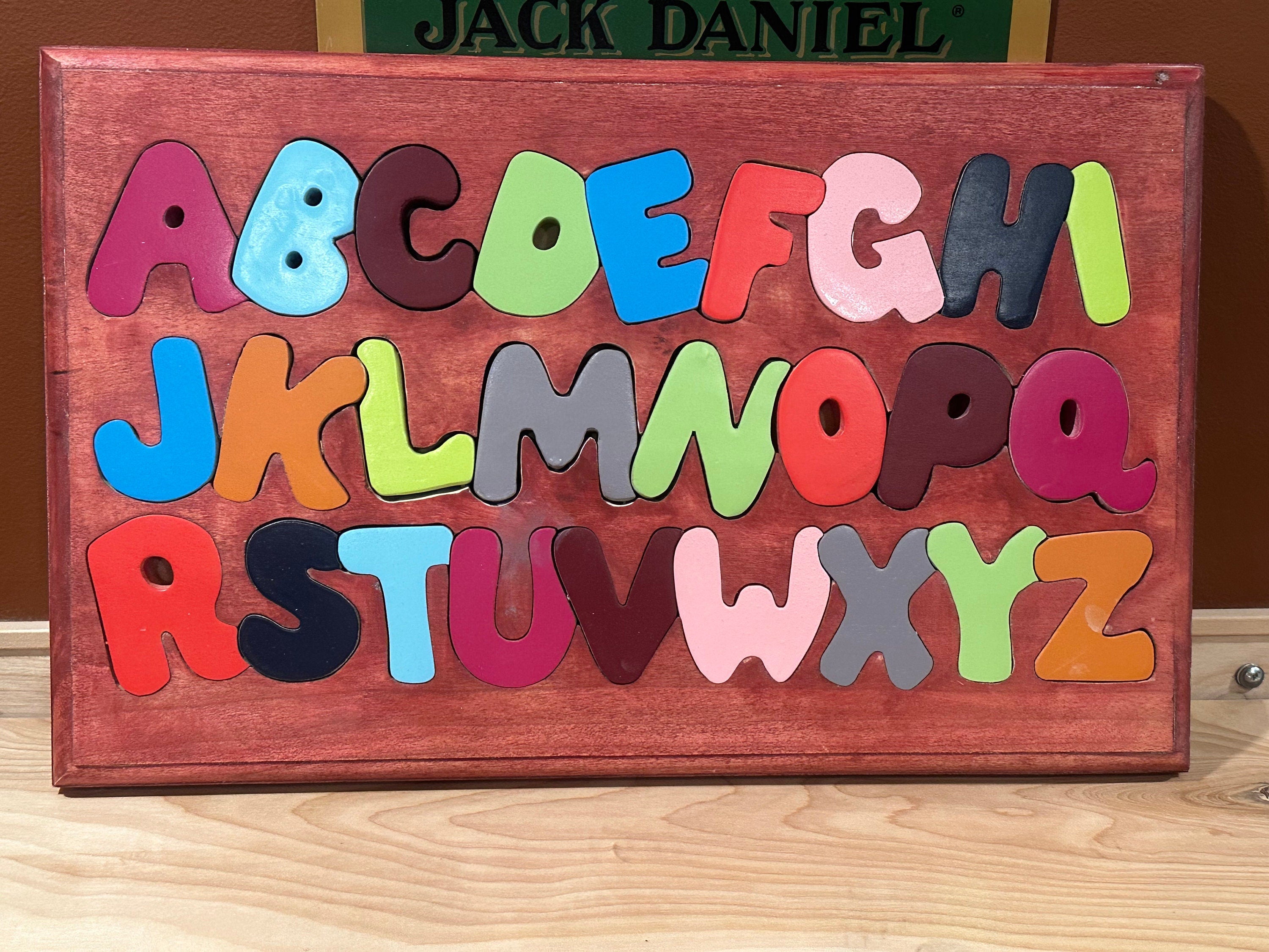 Alphabet puzzle. 11” X 18”.  Letters are 1/2 inch thick.   Wood type. Select pine, poplar and oak