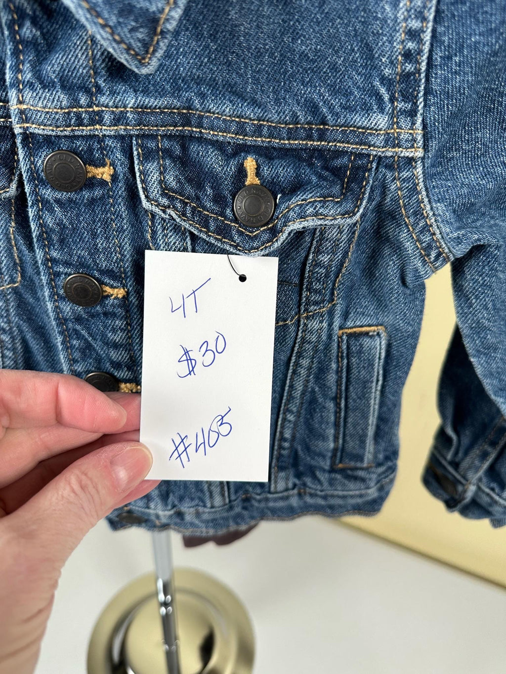 Denim jacket with Green heart on back. 4T size.