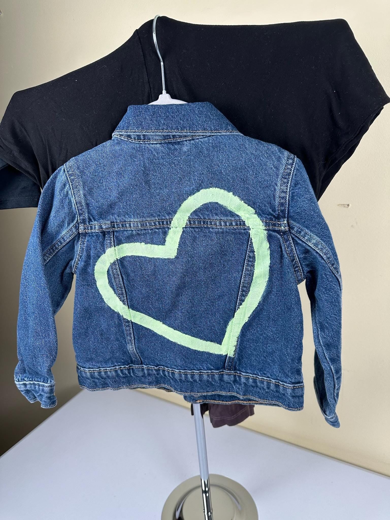 Denim jacket with Green heart on back. 4T size.