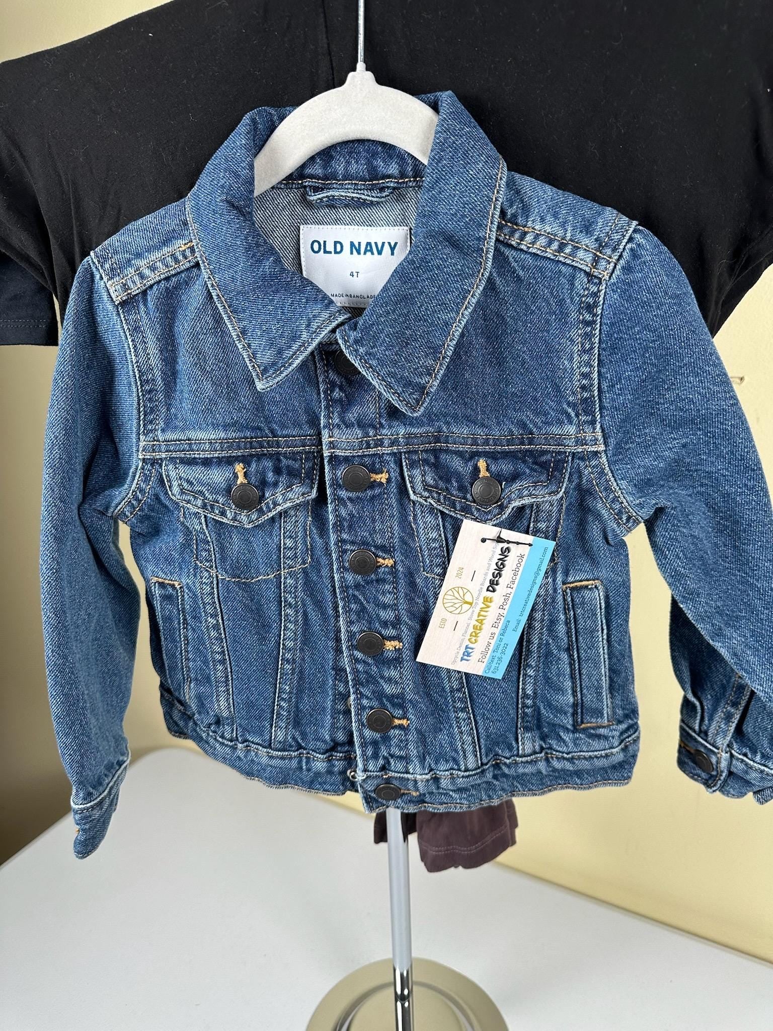 Denim jacket with Green heart on back. 4T size.