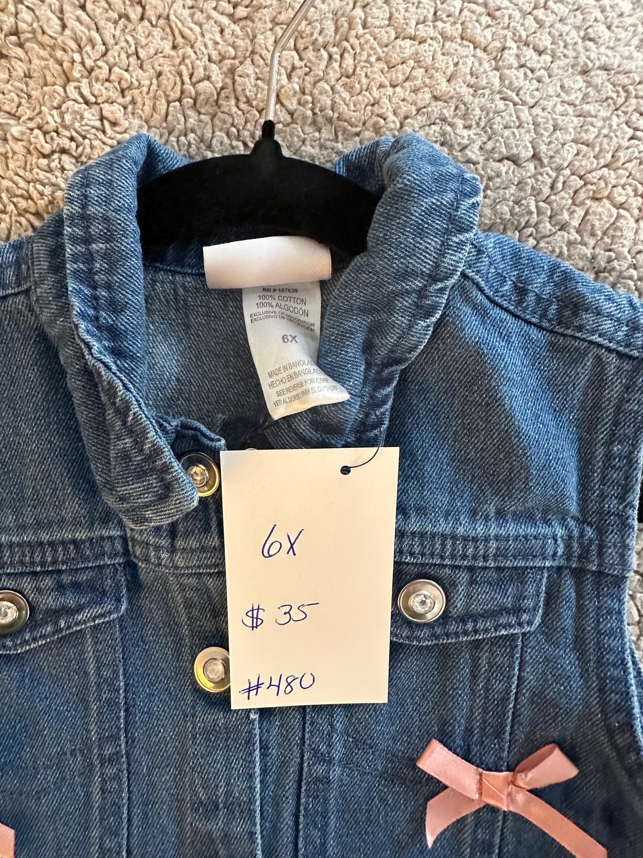 Denim vest with butterfly glitter on back with pink bows on front