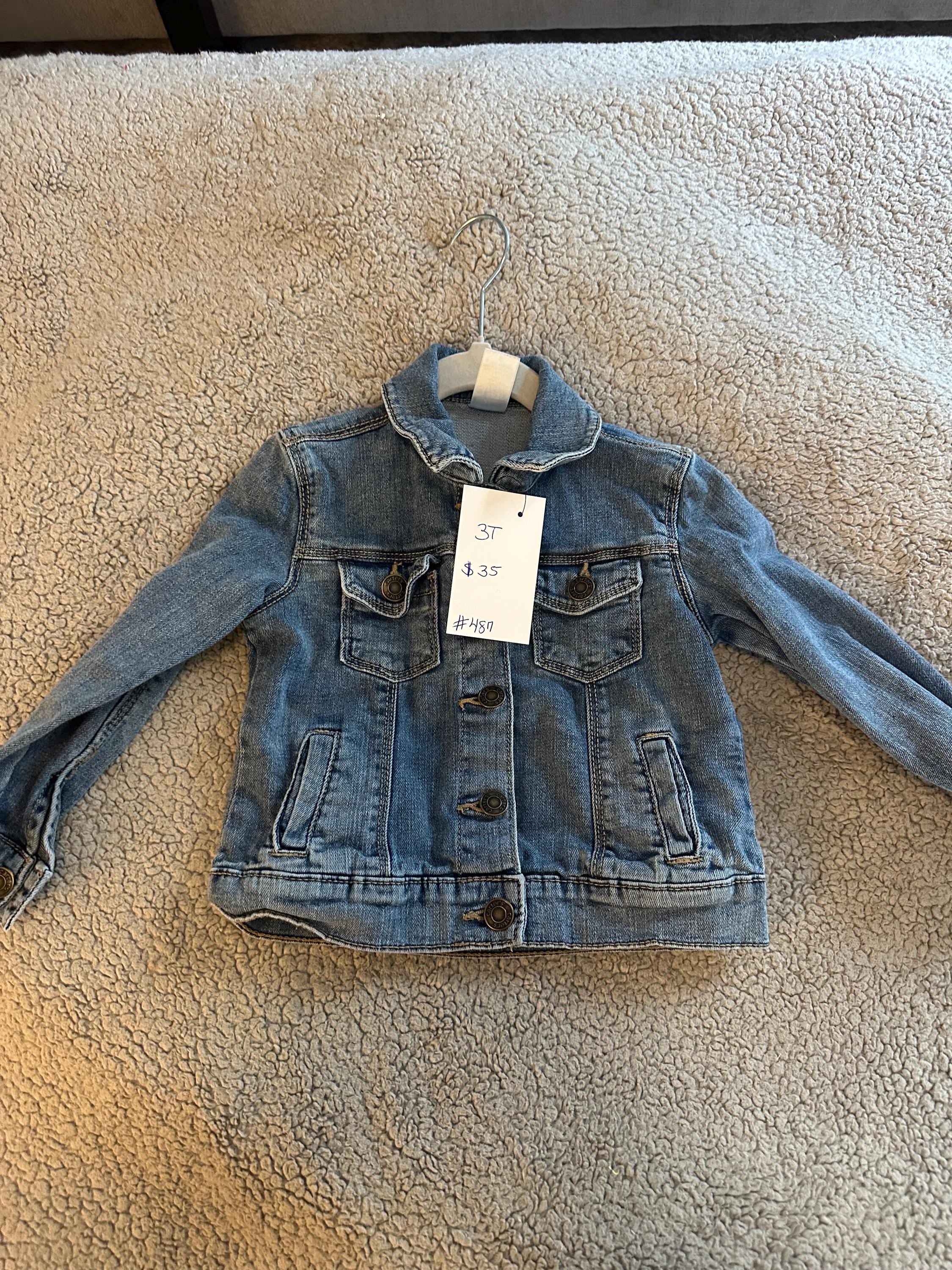 Denim jacket with Sesame Street on the back