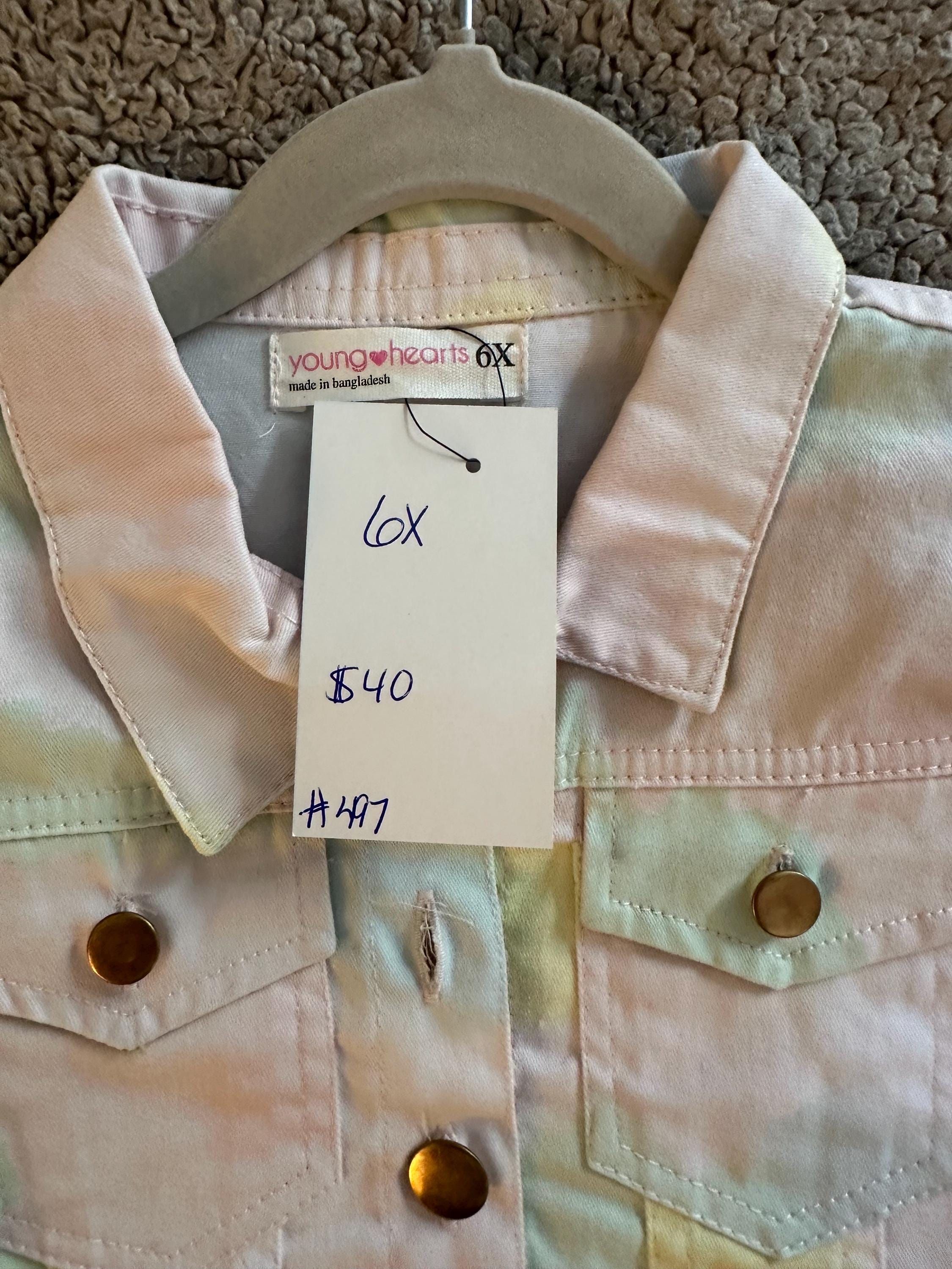 Pink anchor on tie dye denim jacket
