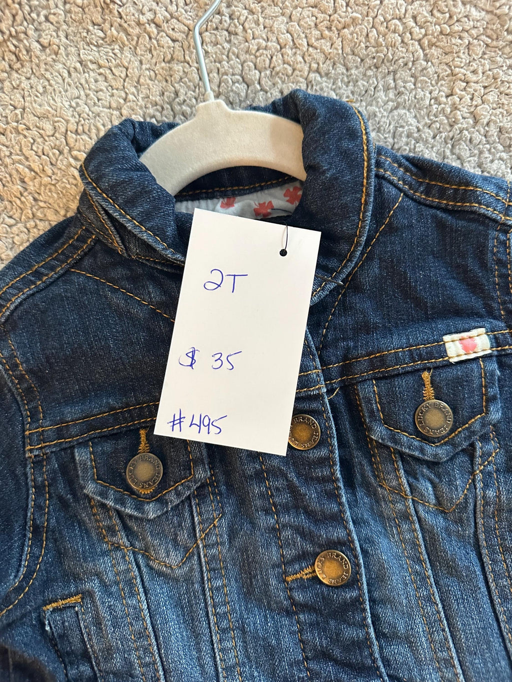 Denim jacket with dogs on the back