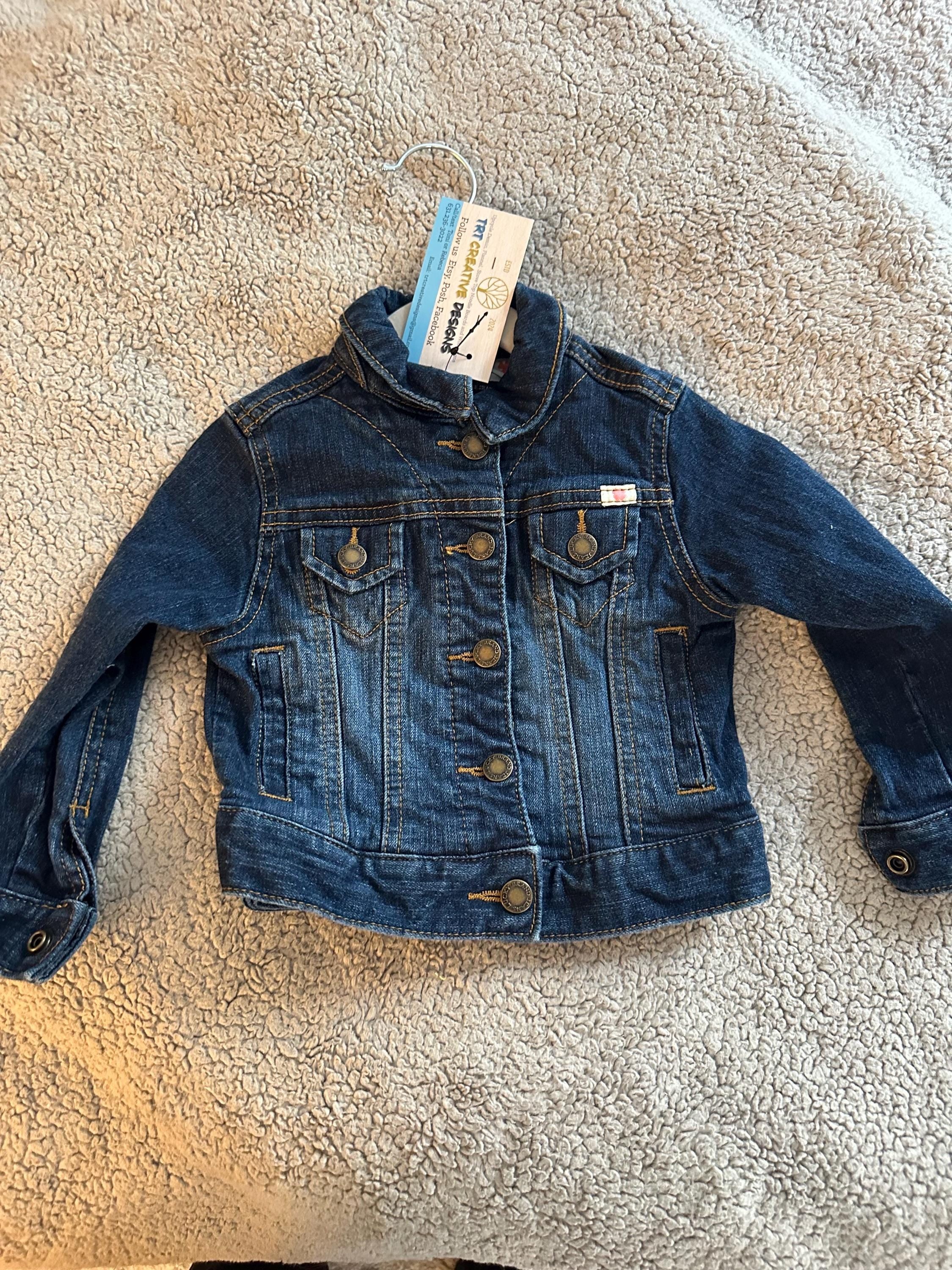 Denim jacket with dogs on the back