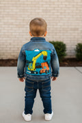 A loader and dump truck on back of denim jacket