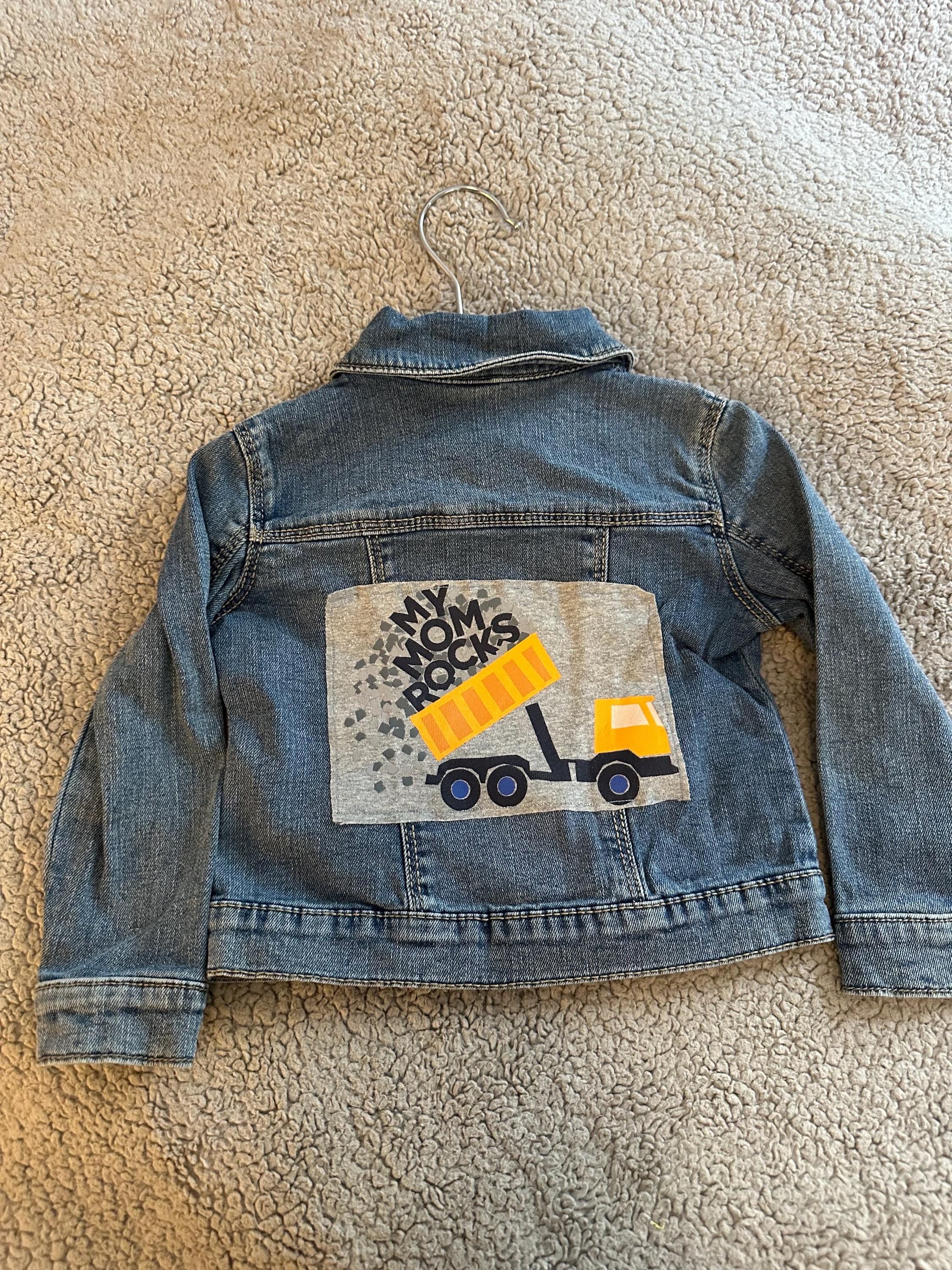 Denim jacket with my mom rocks with a truck on back