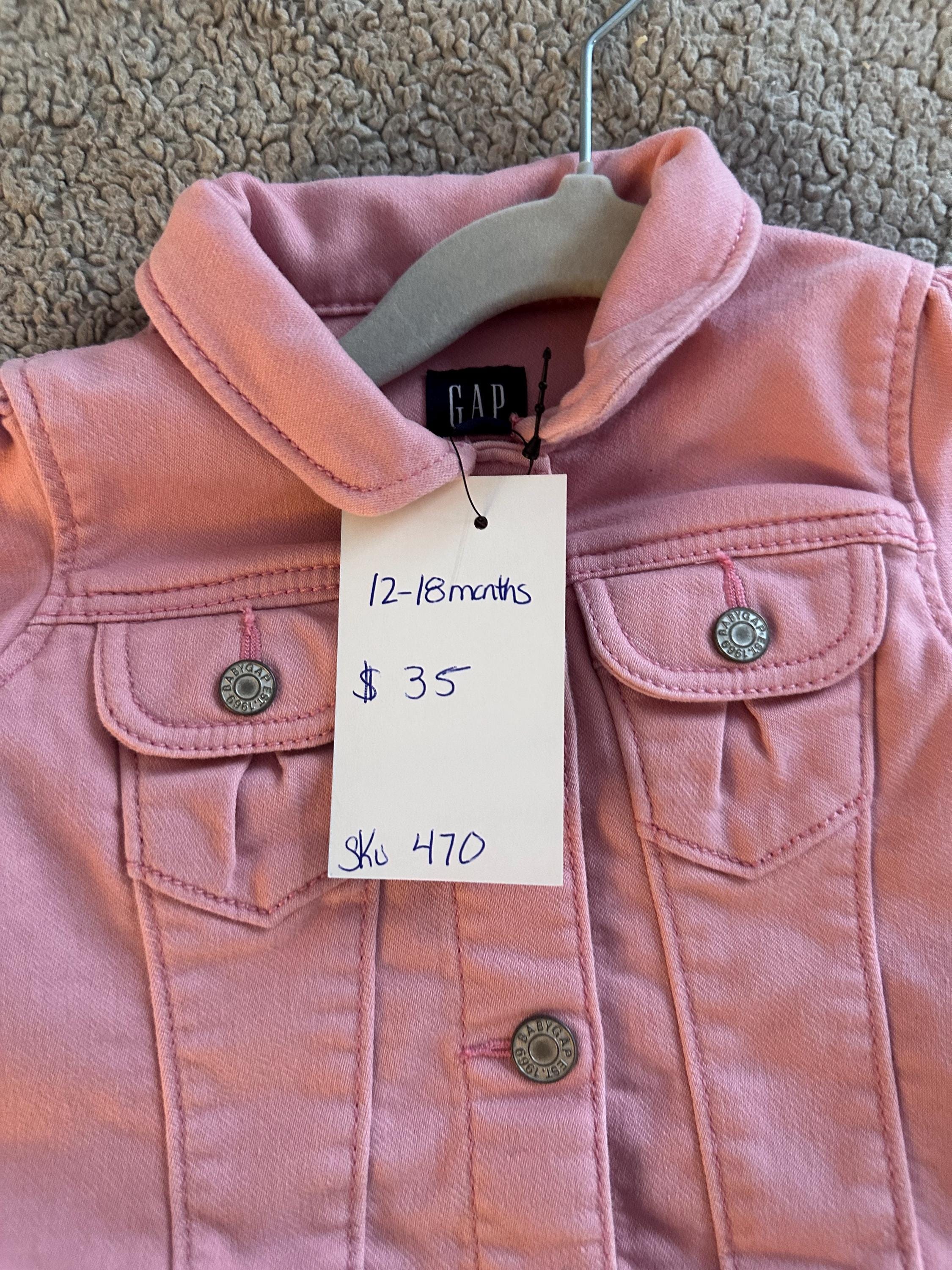 Pink denim jacket with pink butterflies on the back