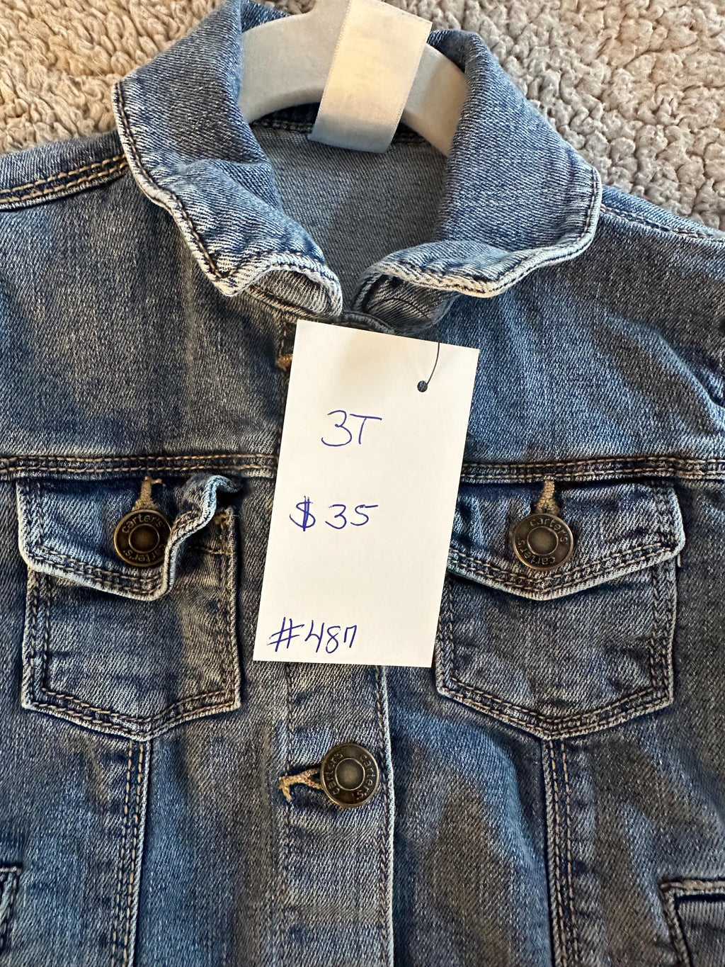 Denim jacket with Sesame Street on the back