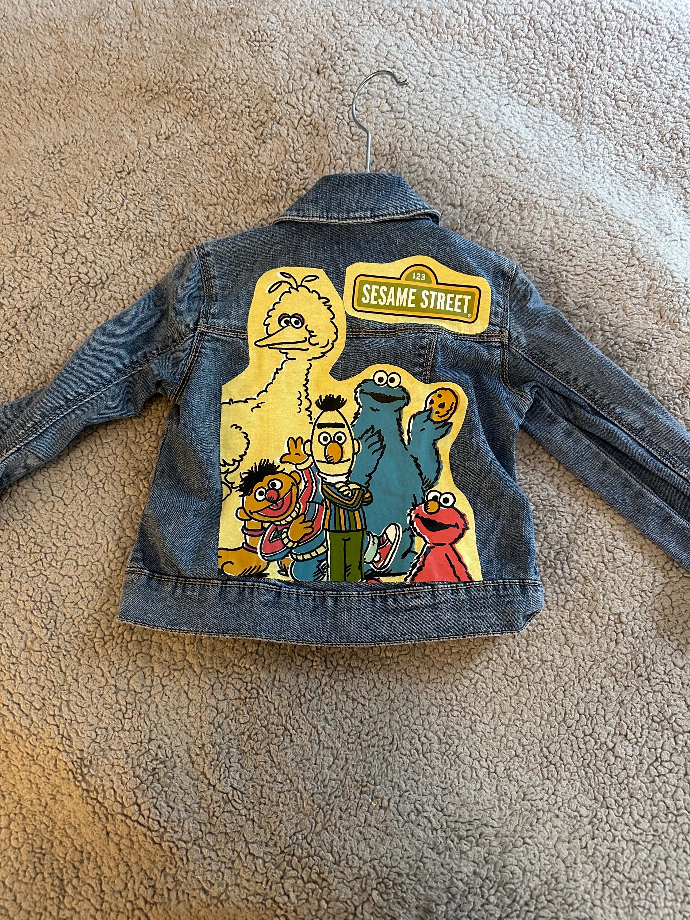 Denim jacket with Sesame Street on the back
